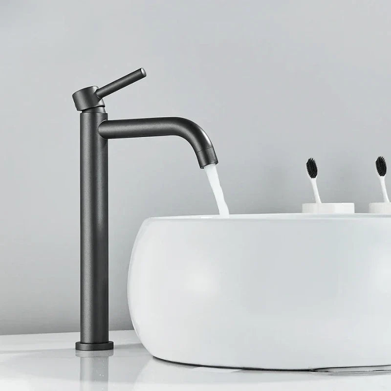 Dark grey faucet with elegant side handle