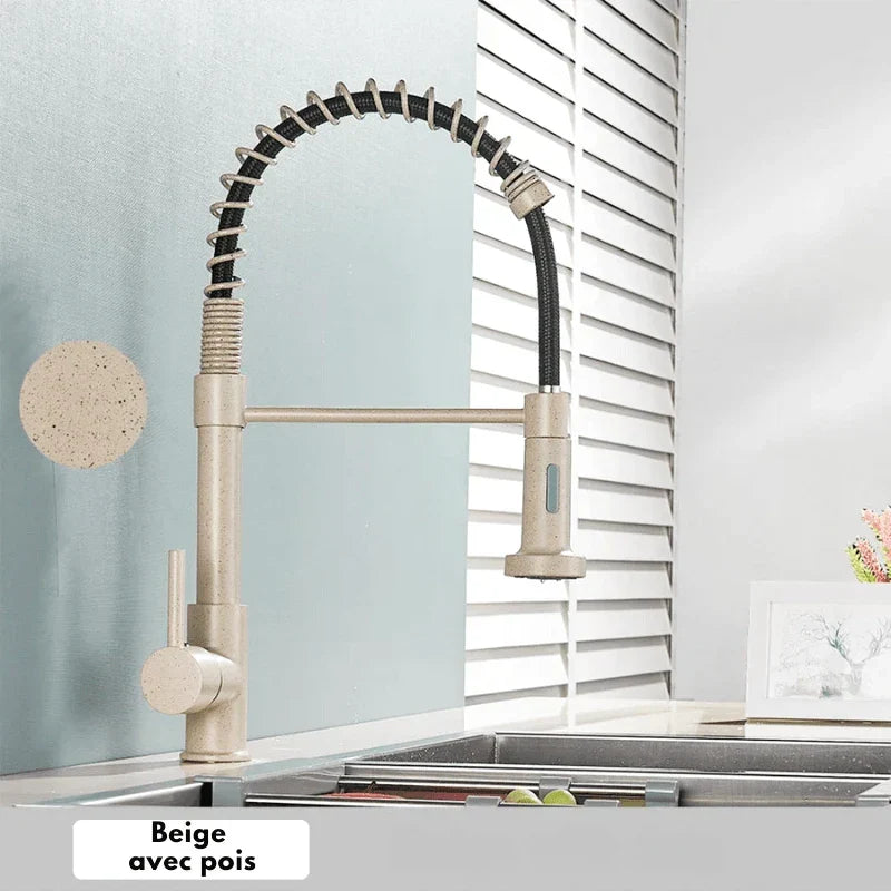 Gold faucet with beige details and polka dot pattern