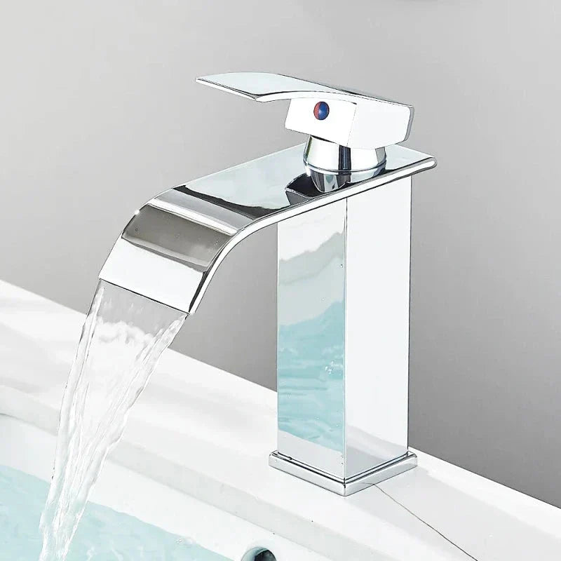 Low chrome tap with ergonomic lever for washbasin