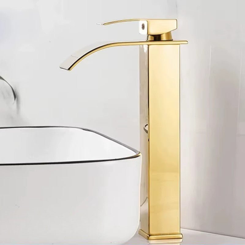 Close-up view of the wide polished stainless steel spout