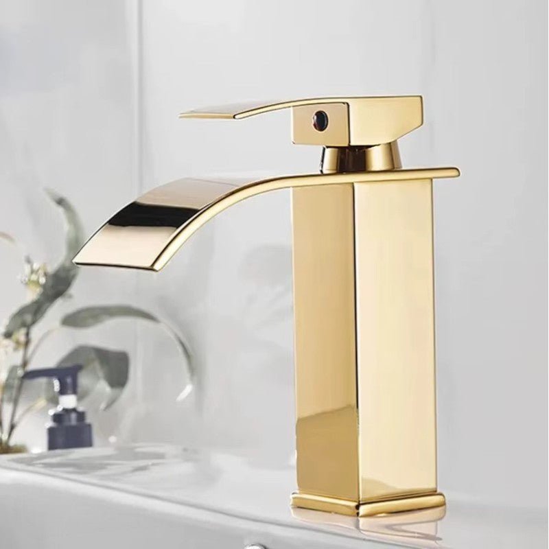 Waterfall faucet installed on a modern sink