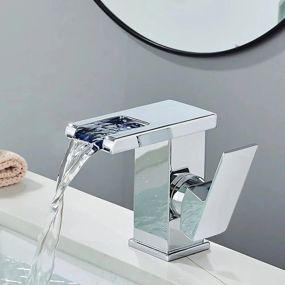 Detail of the stainless steel mixer tap with integrated LED, modern design