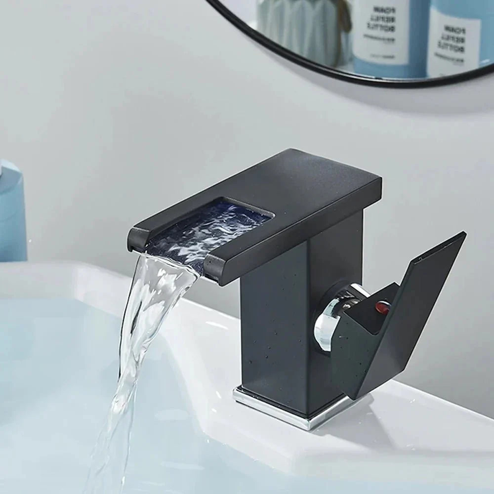 LED tap in operation, light changes with the water