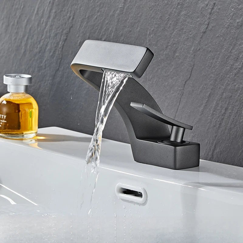 Modern faucet with single handle and waterfall spout