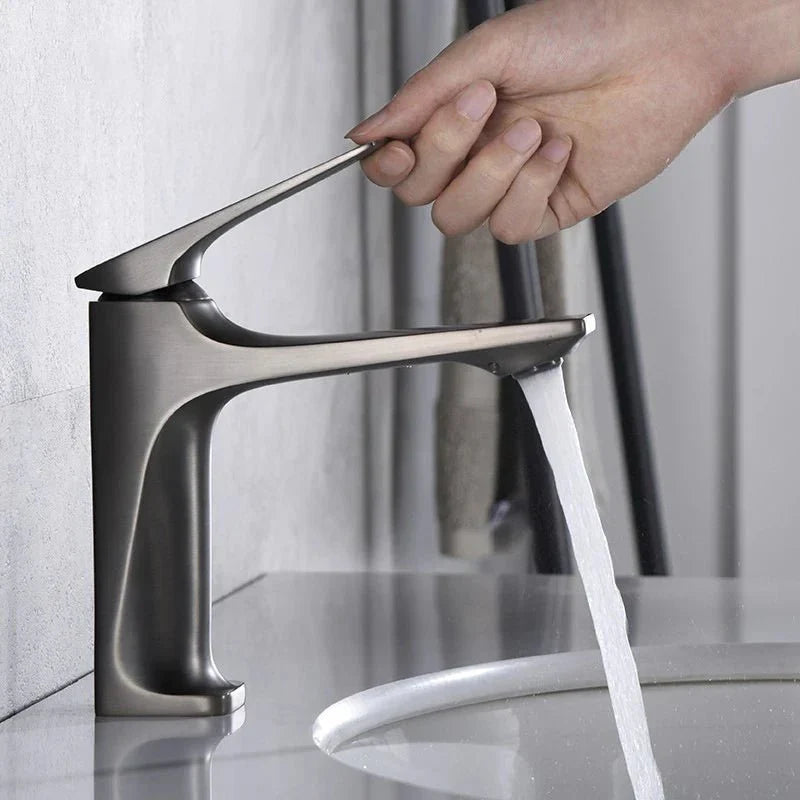 Side view of a contemporary bathroom faucet