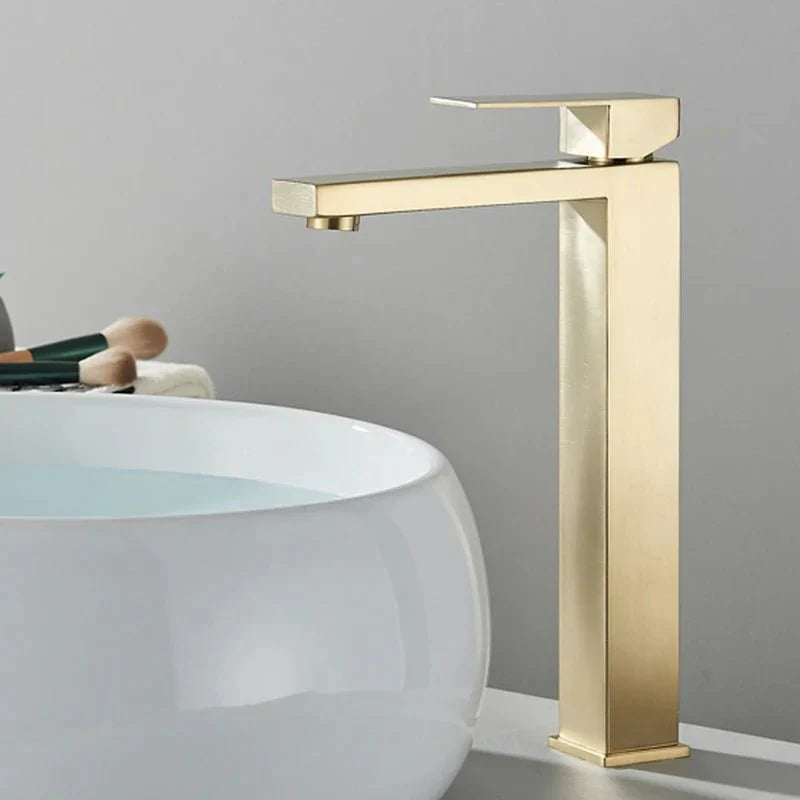 Stainless steel faucet with a black finish, integrated into a bathroom