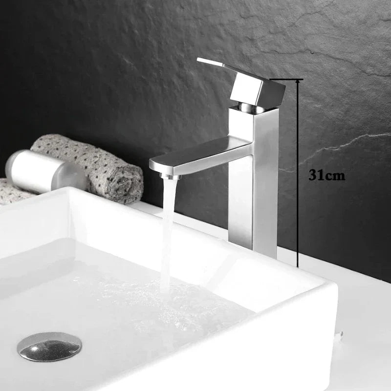Tall tap in brushed stainless steel, slender silhouette