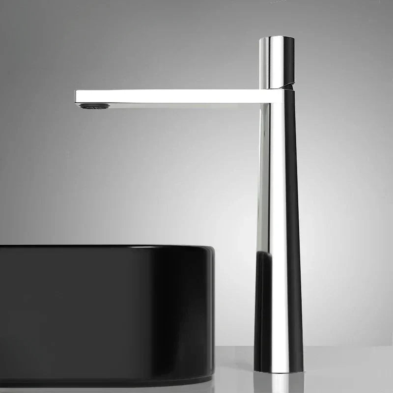 Black and silver faucet with a glossy metallic finish