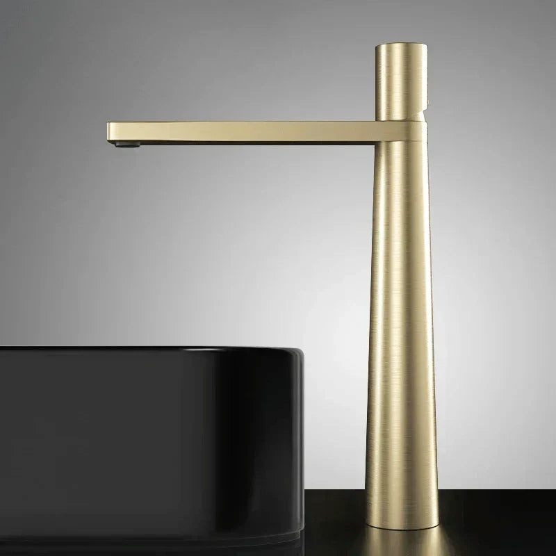 Black and brushed gold faucet with textured finish