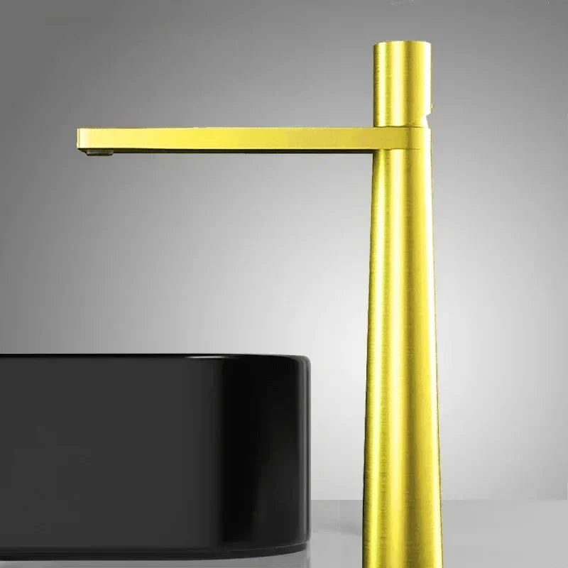 Black and gold faucet with glossy finish, side view