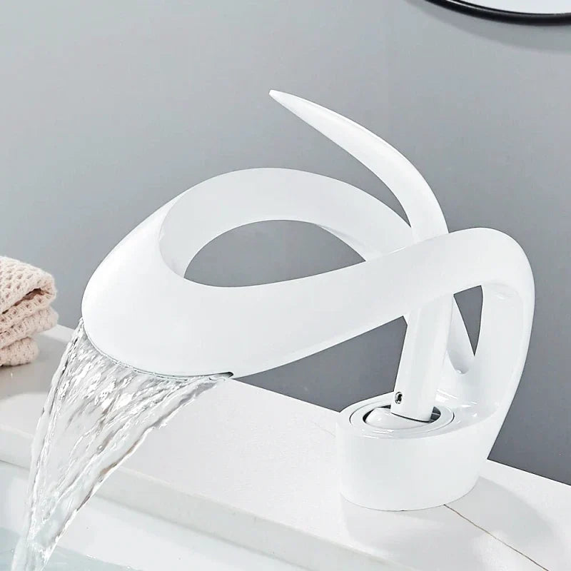 White faucet with waterfall effect, sleek design