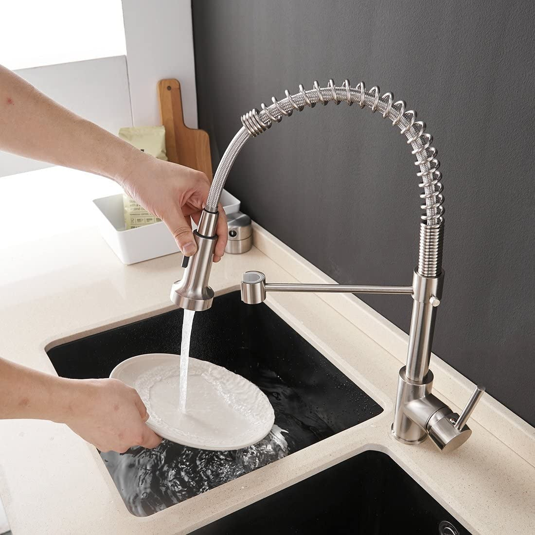 A Kitchen Faucet with a Sprayer Image