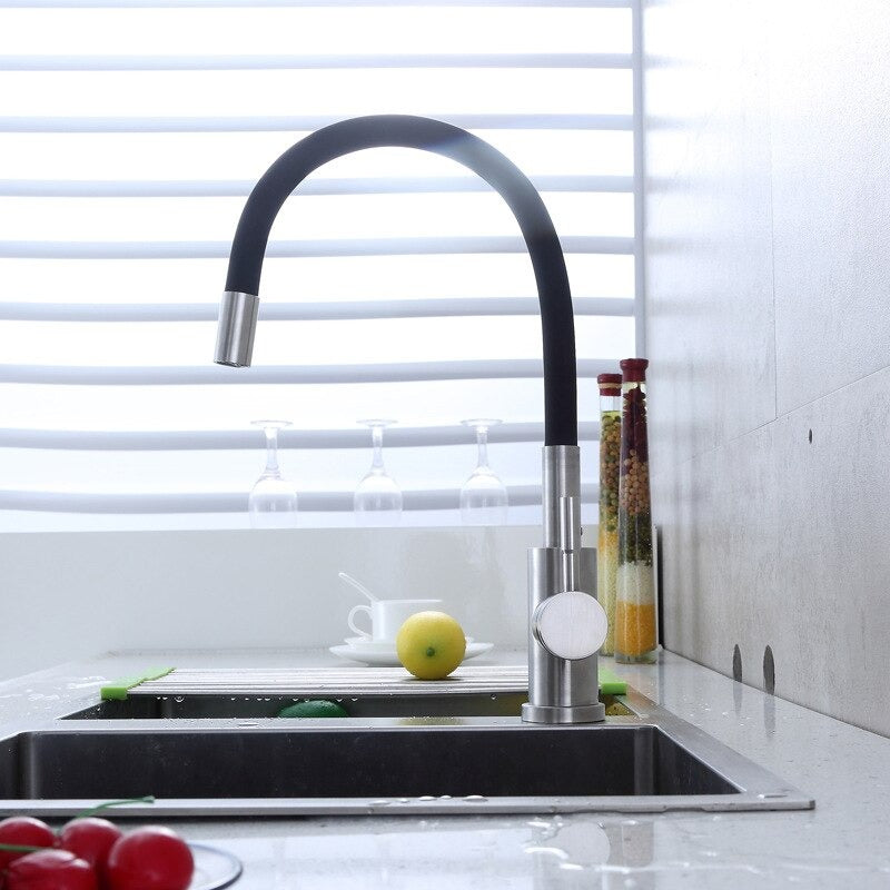 A Stainless Steel Kitchen Faucet with a Pop of Color Image