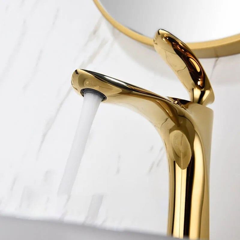 A Gold Bathroom Sink Faucet Image