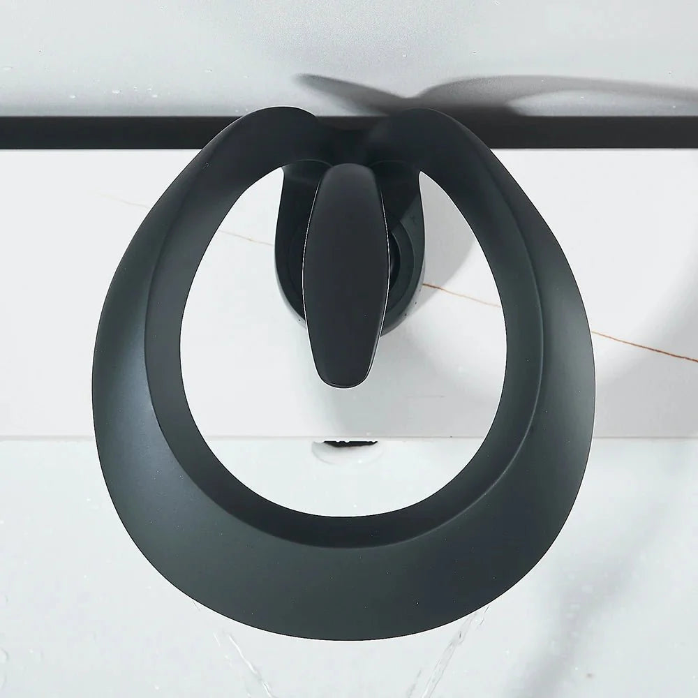 Sculptural Matte Black Waterfall Basin Faucet Image